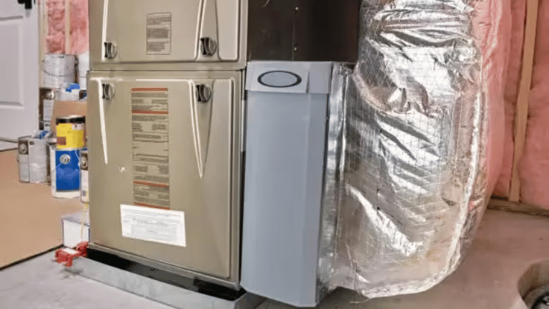 Residential furnace and ductwork installed in a home basement, providing reliable heating and airflow distribution.